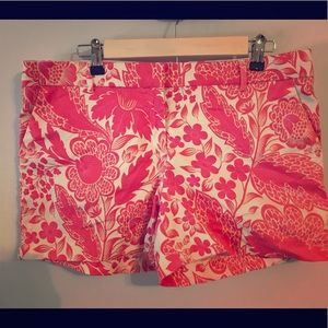 White shorts with pink and orange floral design